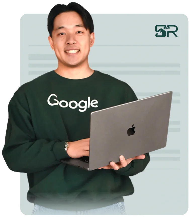 Alex Harlan, founder of Summit Resume, wearing a Google sweater and holding a laptop, on a resume document backdrop